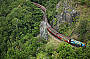 Kuranda Scenic Railway passing Robb's Monument