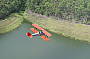 Tiger Moth over Hinze Dam