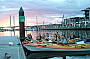 Enjoying fish 'n chips on water dining on the Moonlight Kayak Tour